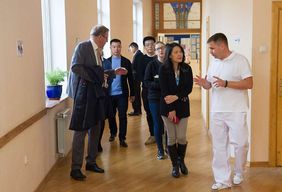 Representatives of Silk Road Sities Alliance in the corridor of the clinic